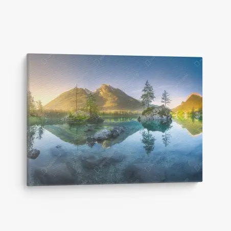 Canvas print alpine lake at sunrise with mirror reflection • Wallissimo®