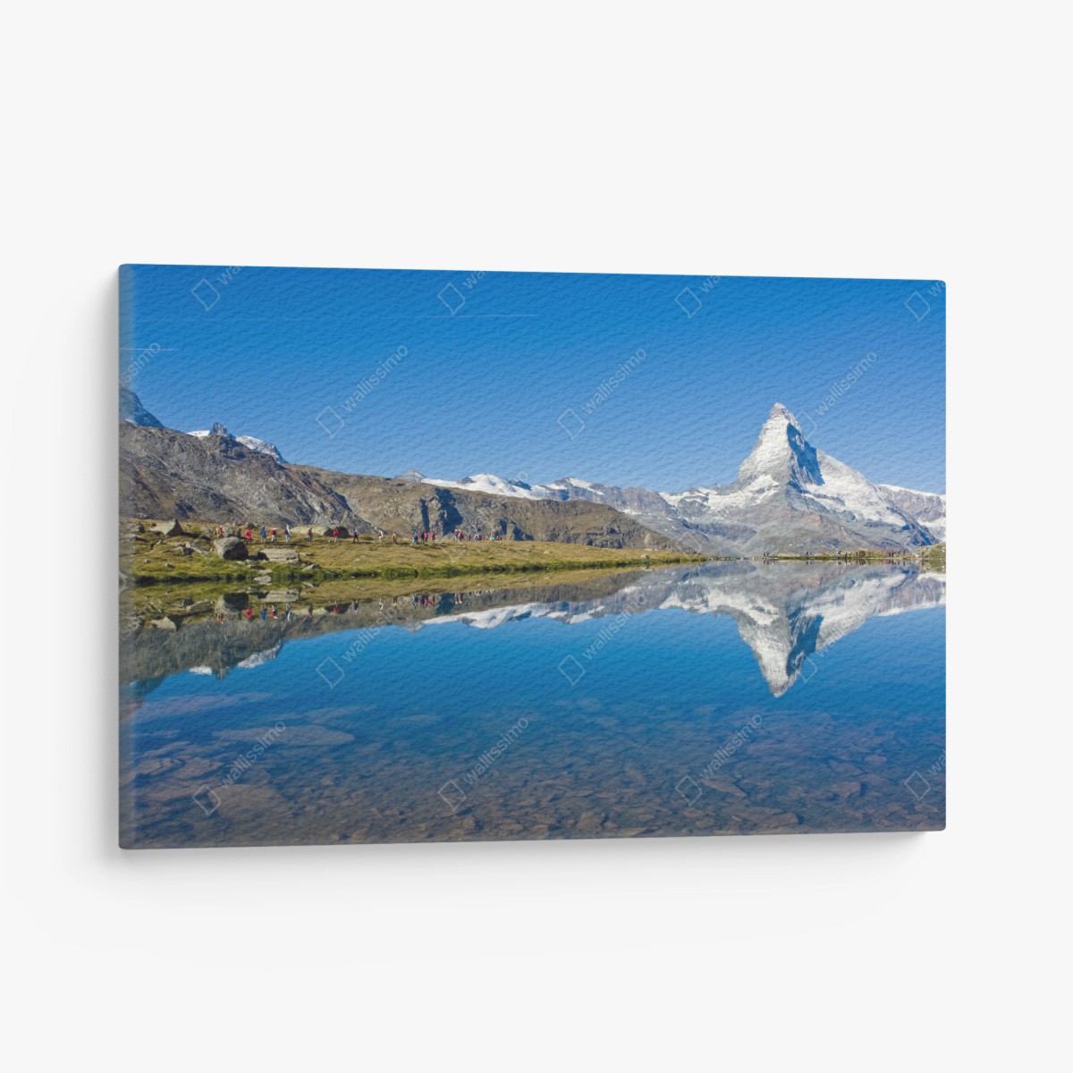 Canvas print alpine mountain reflection over calm lake • Wallissimo®