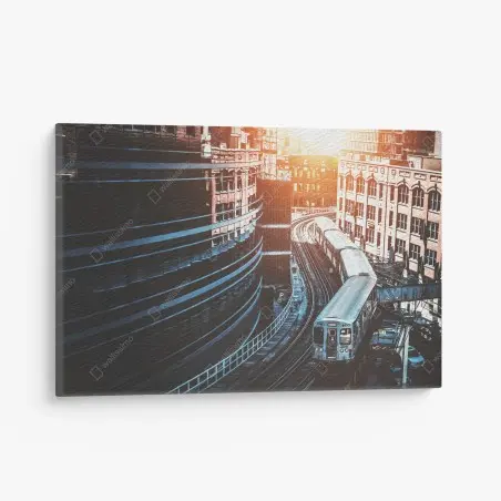 Canvas print Chicago elevated train between buildings • Wallissimo®