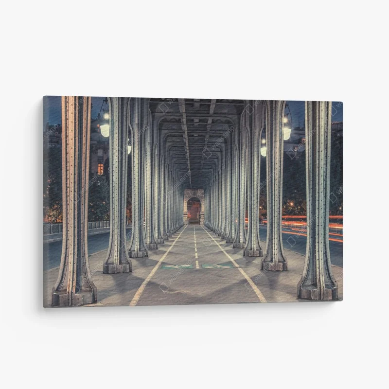 Canvas print symmetrical iron bridge corridor at night