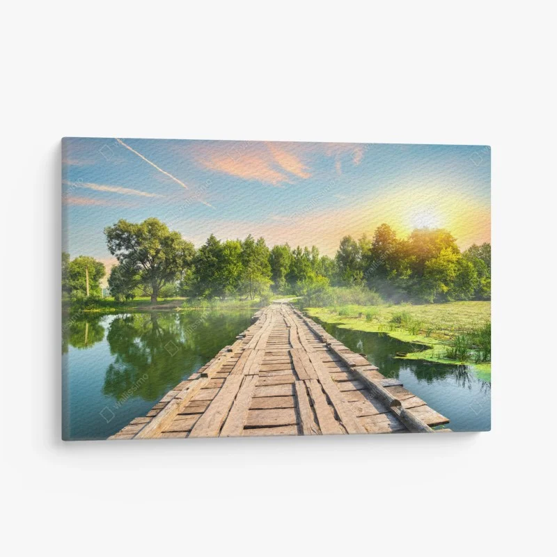 Canvas print sunlit wooden bridge over tranquil lake