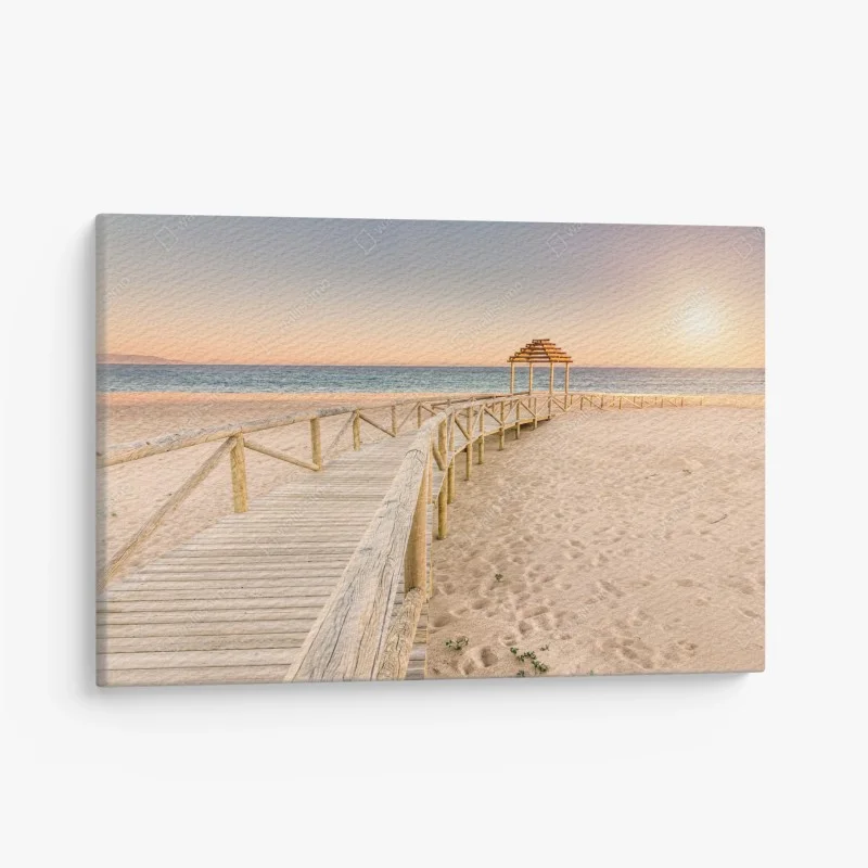 Canvas print wooden boardwalk to Trafalgar beach at sunset