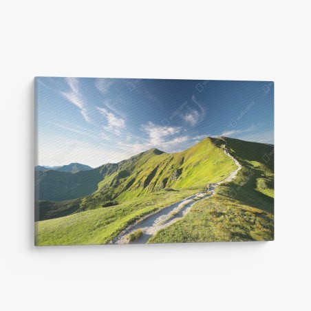 Canvas print sunlit mountain ridge trail • Wallissimo®