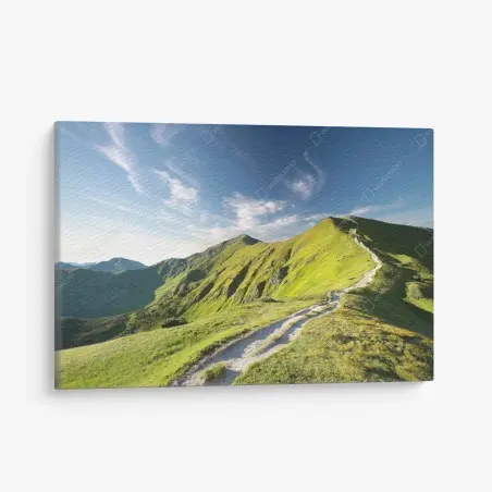 Canvas print sunlit mountain ridge trail • Wallissimo®