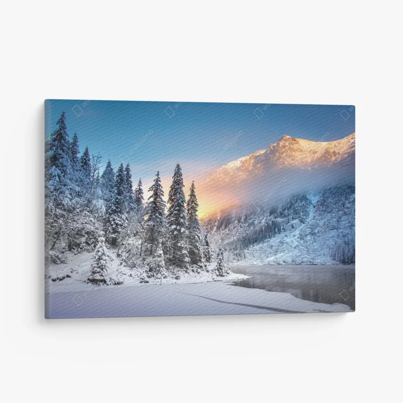 Canvas print winter sunrise over snowy mountain lake