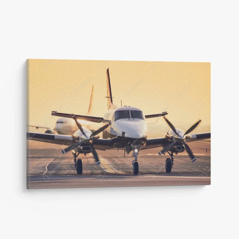 Canvas print twin-engine turboprop on a golden runway