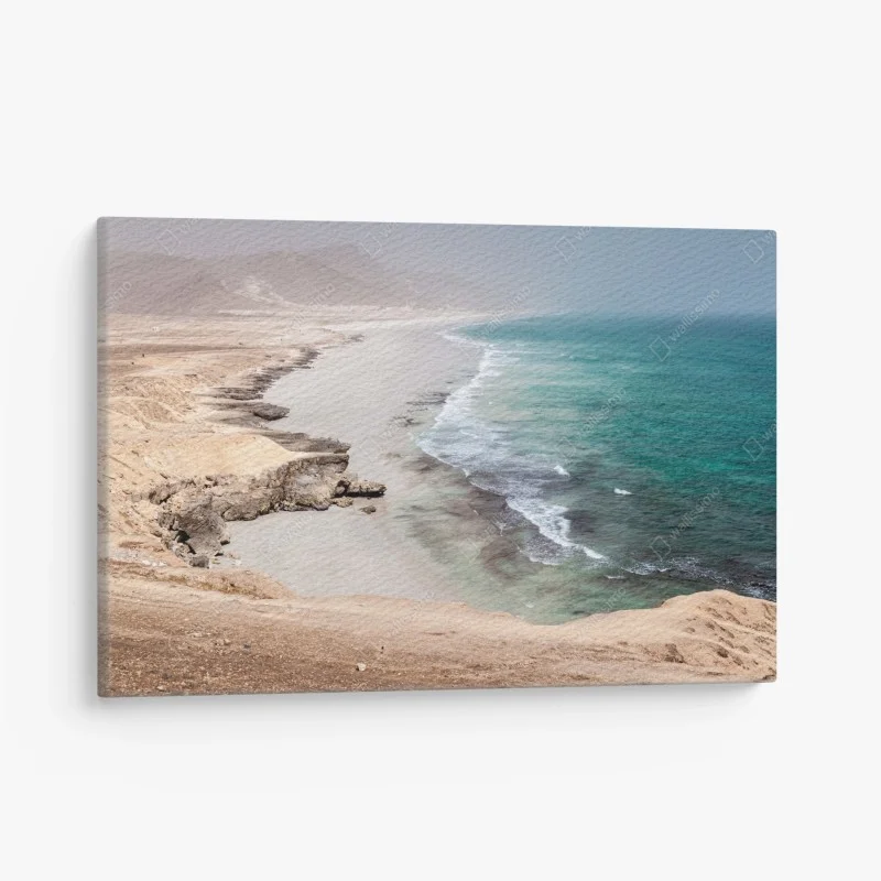 Canvas print serene turquoise coastline over desert cliffs