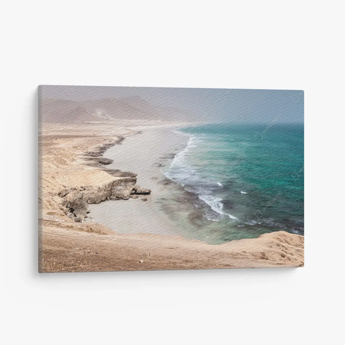 Canvas print serene turquoise coastline over desert cliffs • Wallissimo®