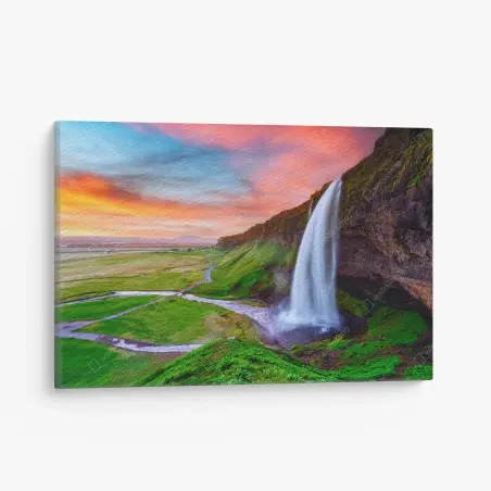 Canvas print Seljalandsfoss waterfall at sunset • Wallissimo®