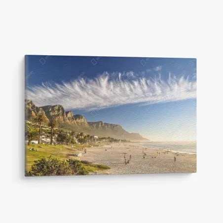 Canvas print sunlit beach with mountain backdrop • Wallissimo®