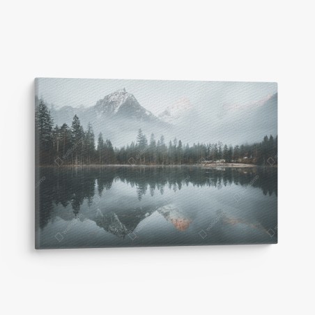 Canvas print misty alpine reflection over tranquil lake • Wallissimo®