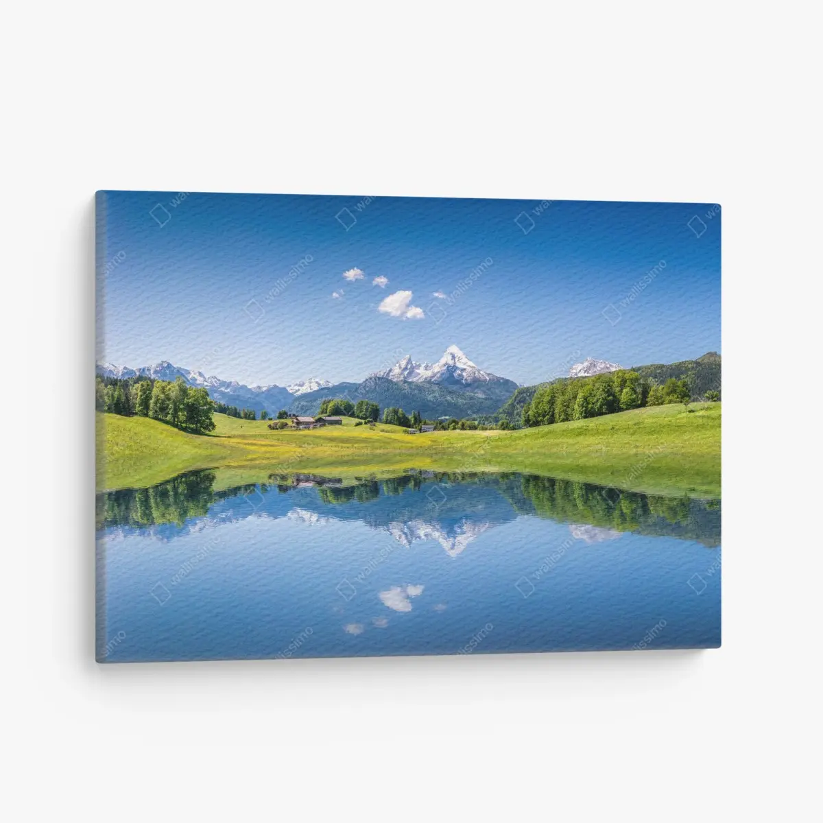 Canvas print alpine peaks reflected in a tranquil lake • Wallissimo®