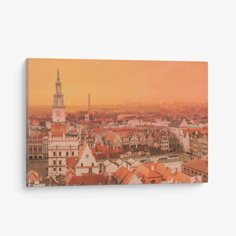 Canvas print warm sunset over historic city rooftops