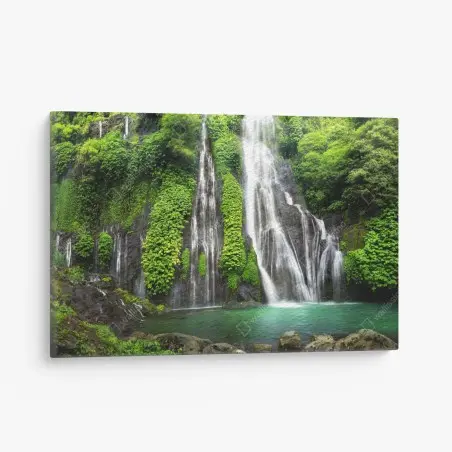 Canvas print serene waterfall in emerald forest • Wallissimo®