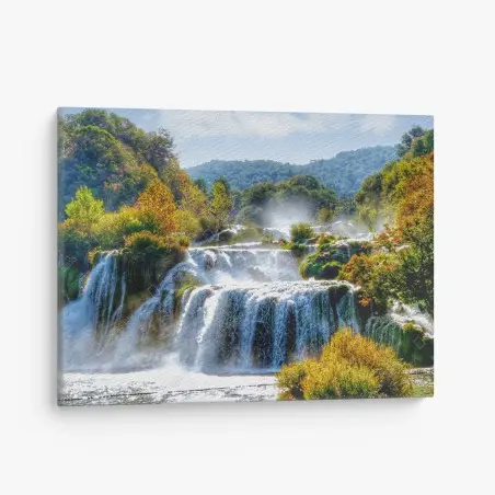 Canvas print cascading waterfall in lush forest • Wallissimo®