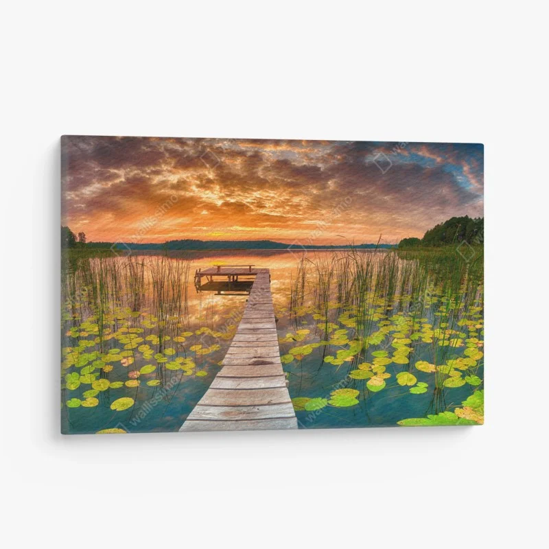 Canvas print sunrise over tranquil lake with wooden pier