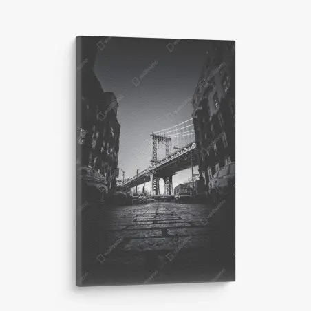 Canvas print Manhattan bridge perspective over cobblestone street • Wallissimo®