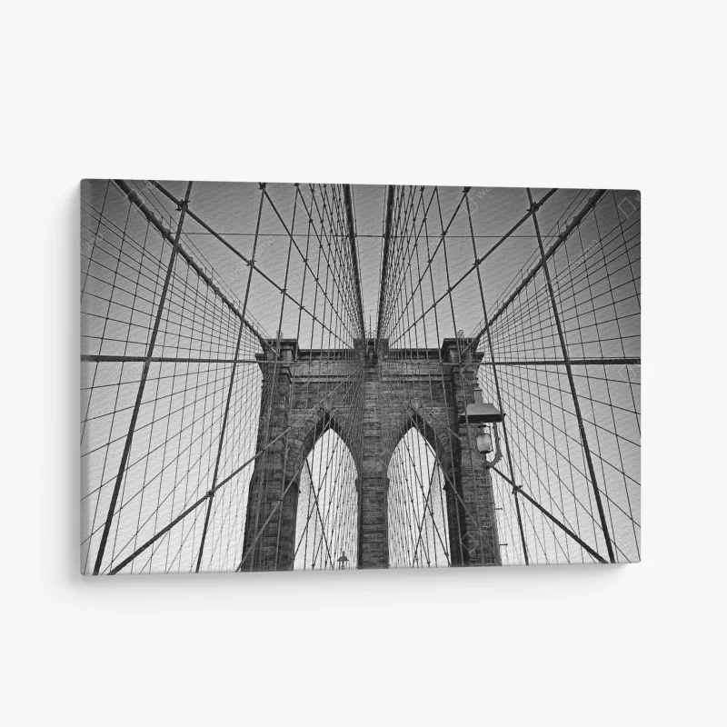 Canvas print symmetric suspension bridge in black and white