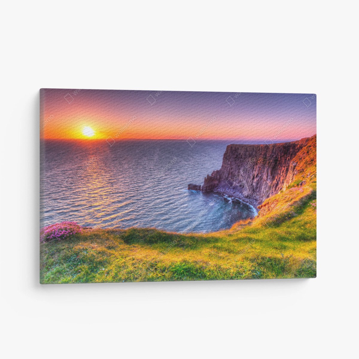 Canvas print sunset over rugged coastal cliffs • Wallissimo®
