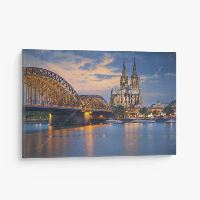 Canvas print Cologne cathedral and bridge at dusk