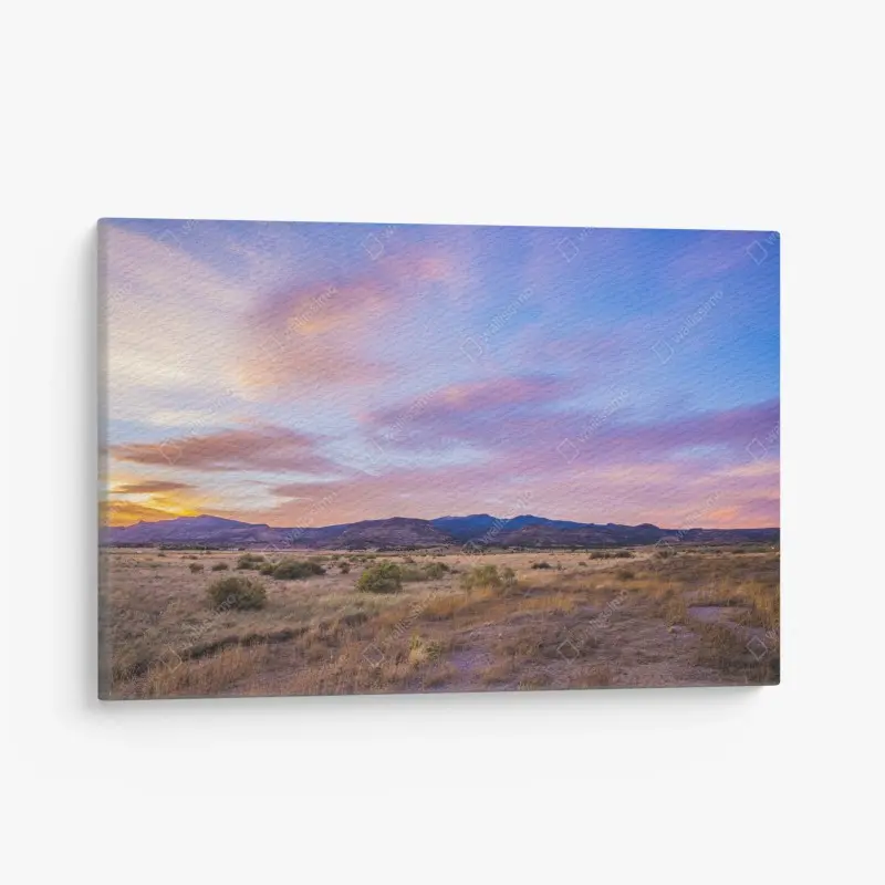 Canvas print pastel sunset over desert mountains