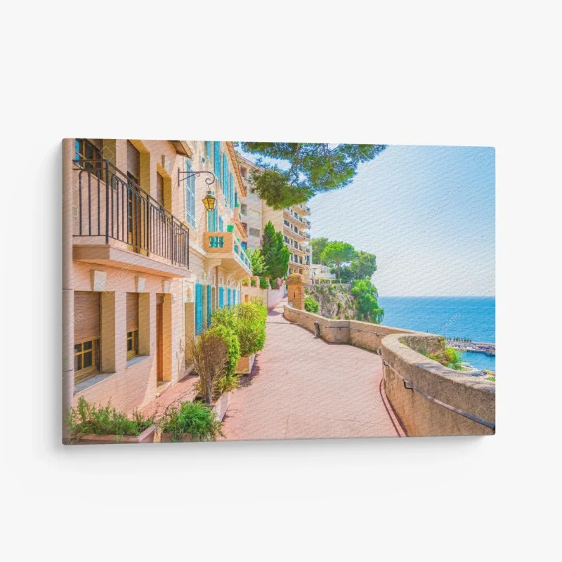 Canvas print mediterranean seaside promenade with pastel buildings