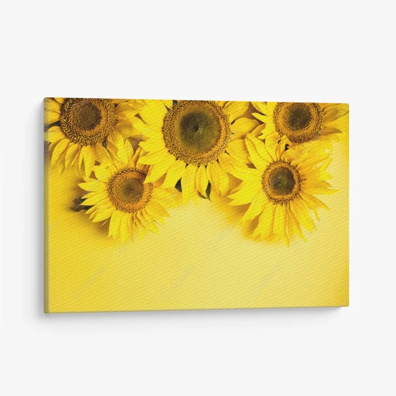 Canvas print bright sunflower bouquet on yellow background