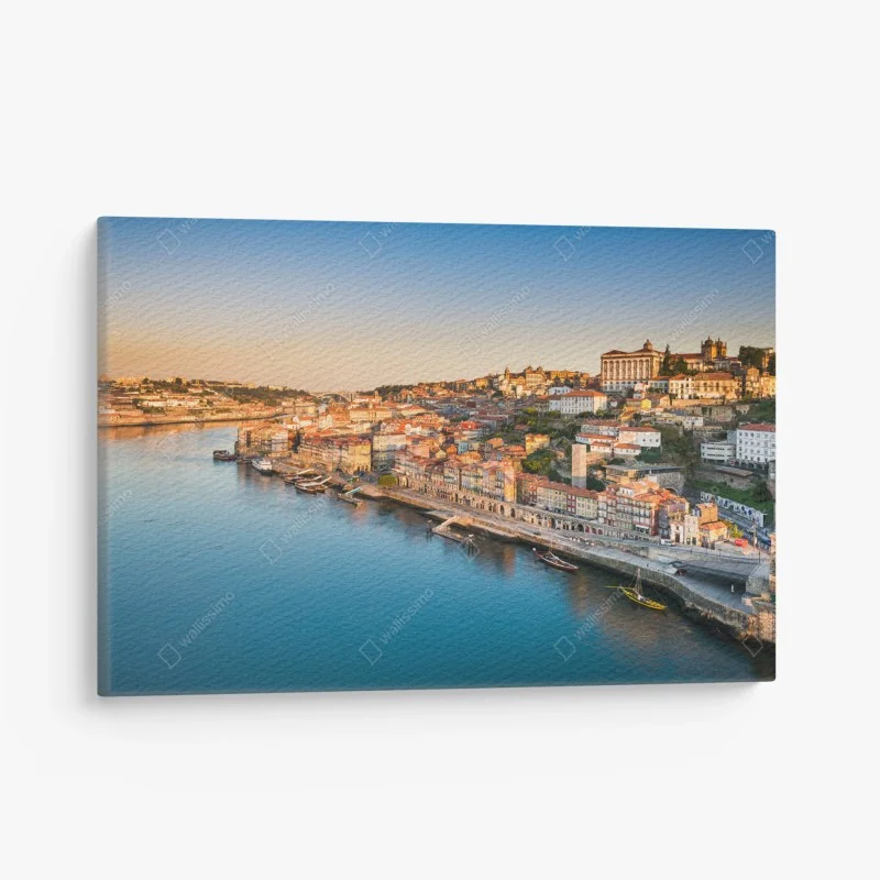Canvas print sunlit Porto riverside skyline at golden hour