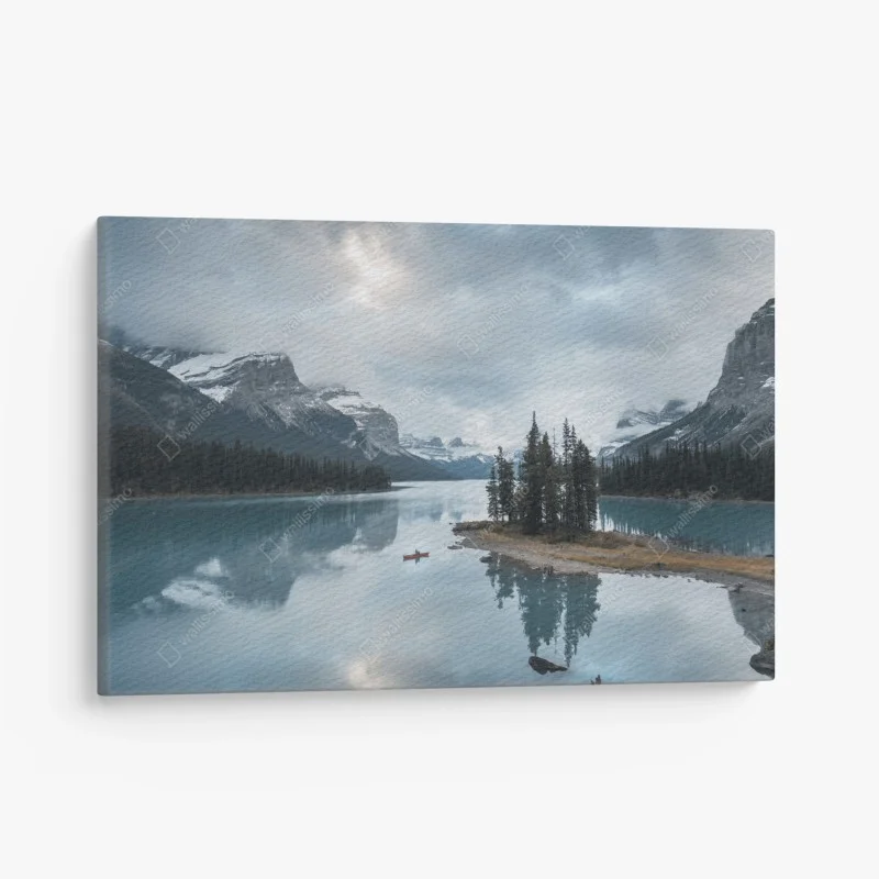 Canvas print tranquil alpine lake with island and canoe