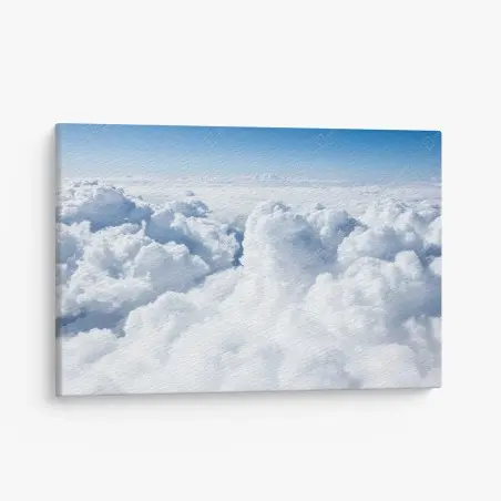 Canvas print view from above: soft clouds and blue sky • Wallissimo®