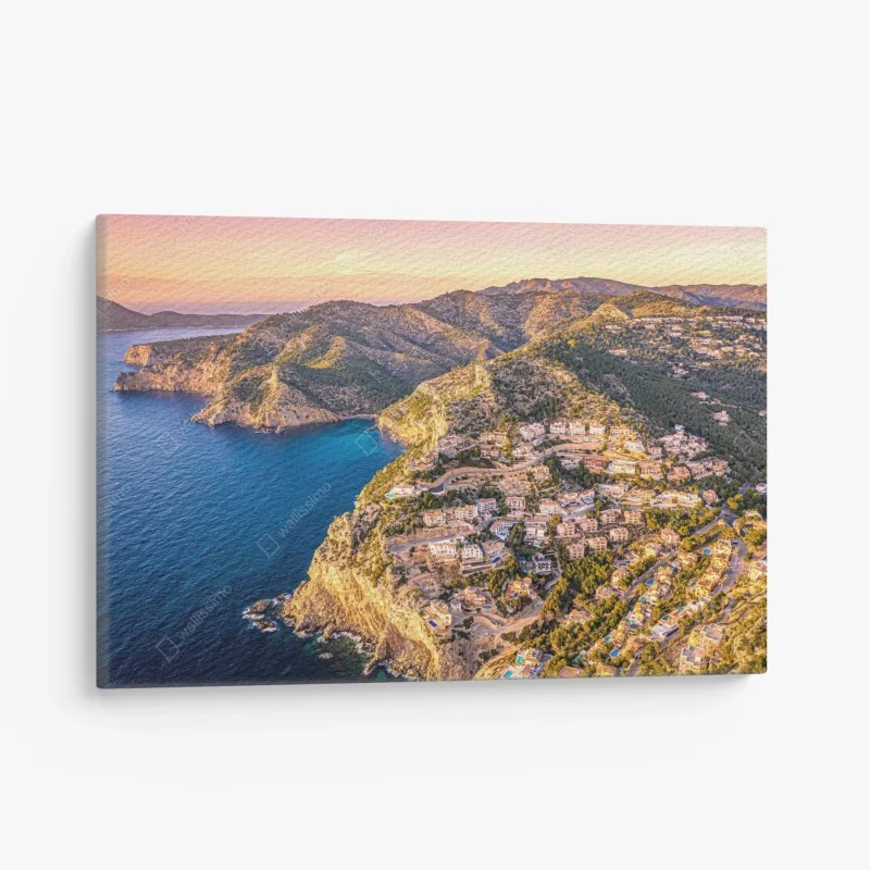 Canvas print sunset coastal landscape over cliffside village