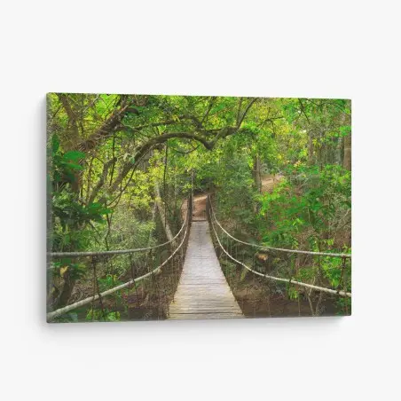 Canvas print suspended forest footbridge through green canopy • Wallissimo®