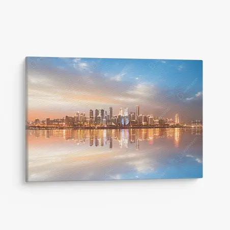 Canvas print city skyline reflected at dusk • Wallissimo®