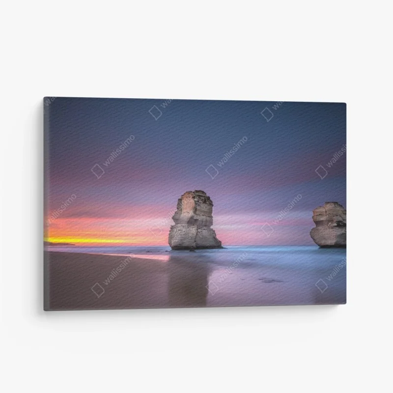 Canvas print serene coastal rock formations at sunset