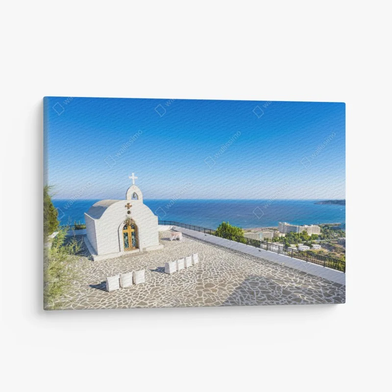 Canvas print white chapel overlooking the sea in Faliraki