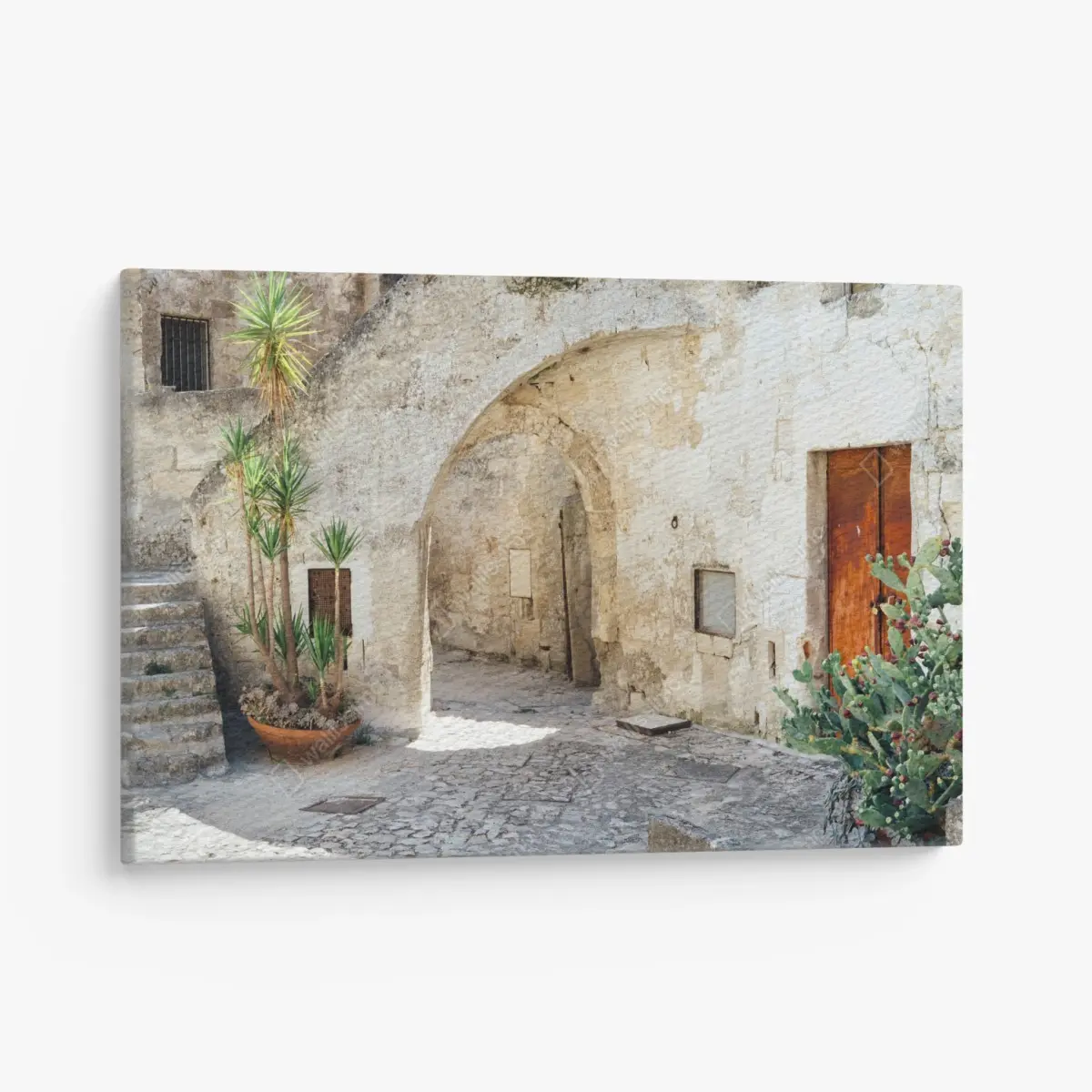 Canvas print mediterranean stone courtyard with arch • Wallissimo®