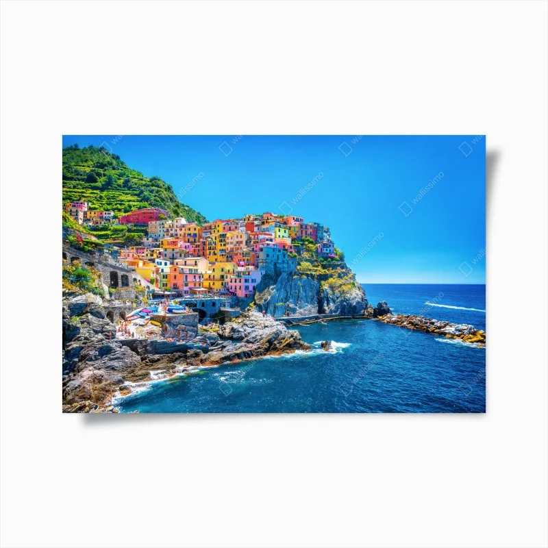 Poster colorful cliffside village by the sea
