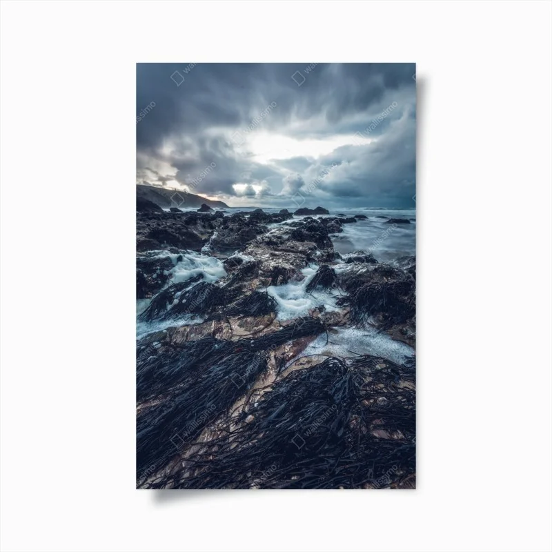 Poster moody rocky coastline at dusk