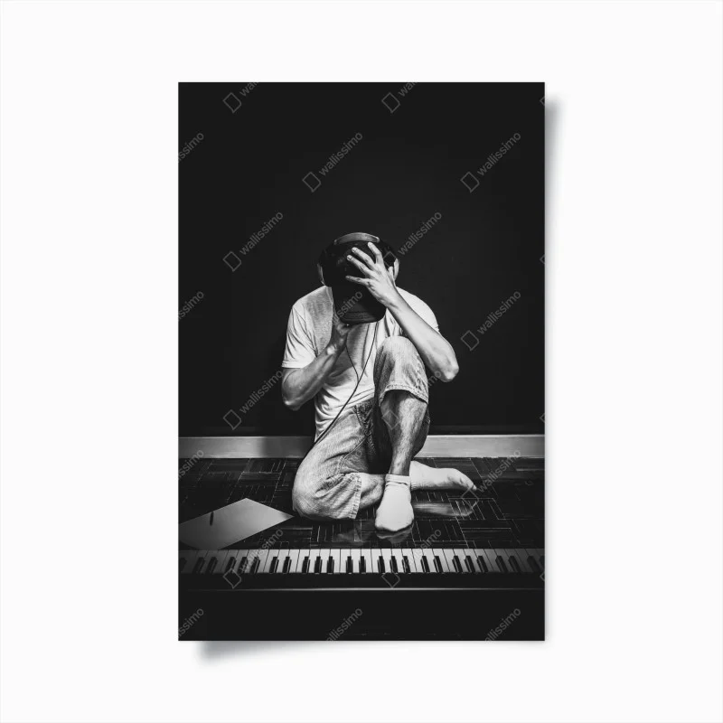 Poster introspective musician at the keyboard