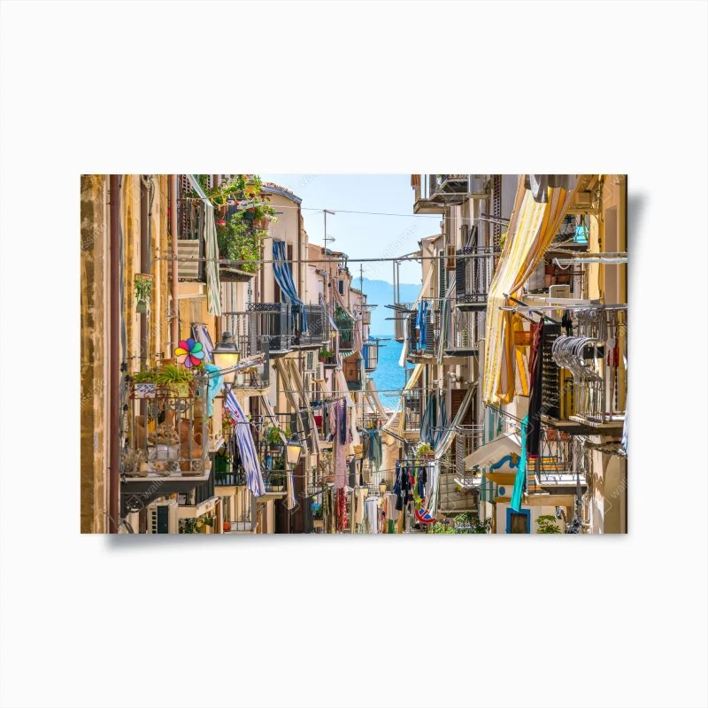 Poster sunlit mediterranean alley with sea view