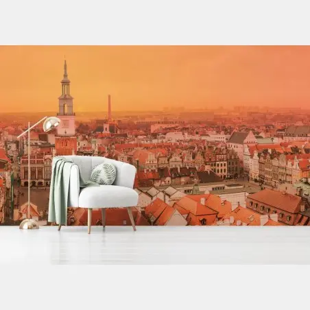 Wall mural warm sunset over historic city rooftops • Wallissimo®