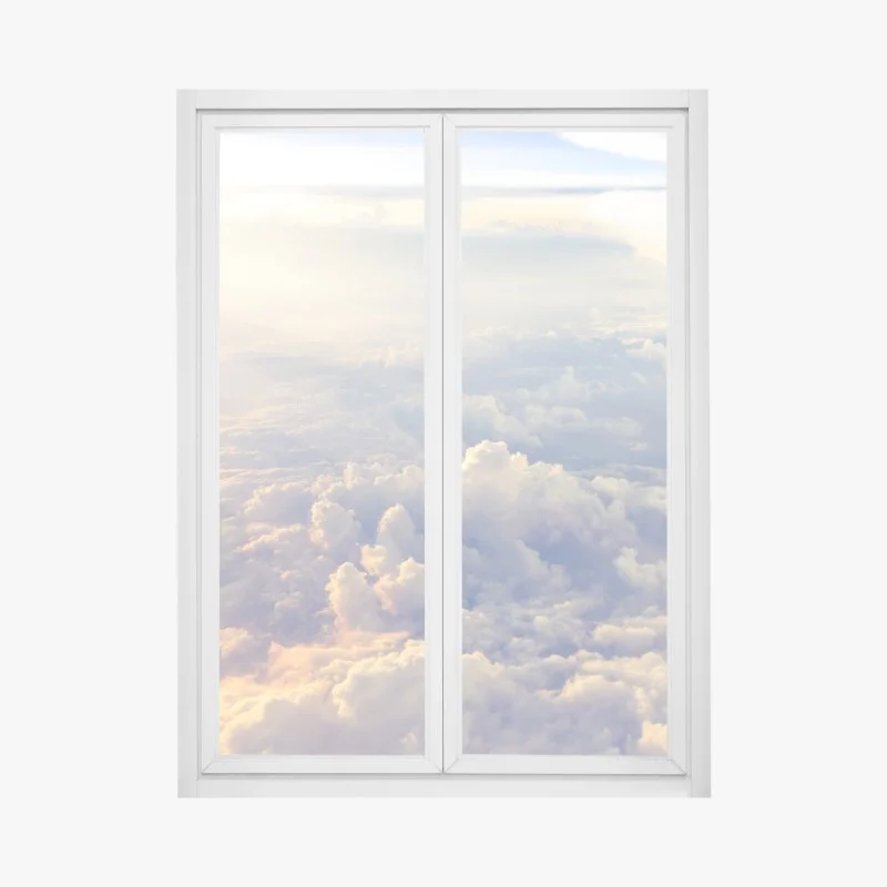 Window decal sunlit clouds above the horizon