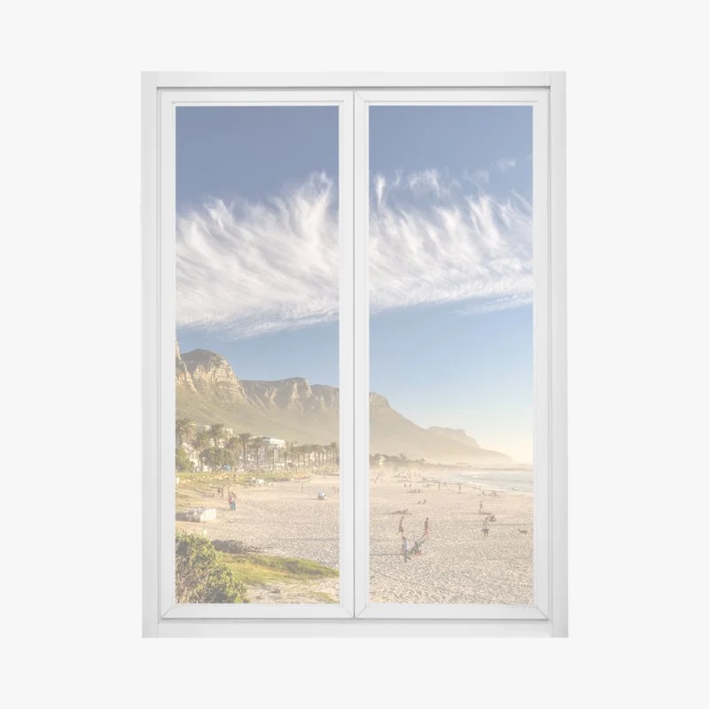 Window decal sunlit beach with mountain backdrop