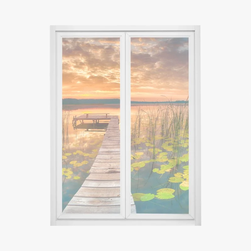 Window decal sunrise over tranquil lake with wooden pier