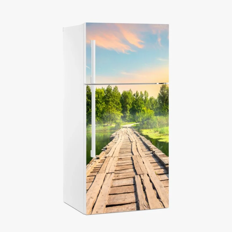 Fridge sticker sunlit wooden bridge over tranquil lake