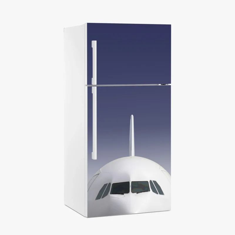 Fridge sticker front view of airplane against blue sky