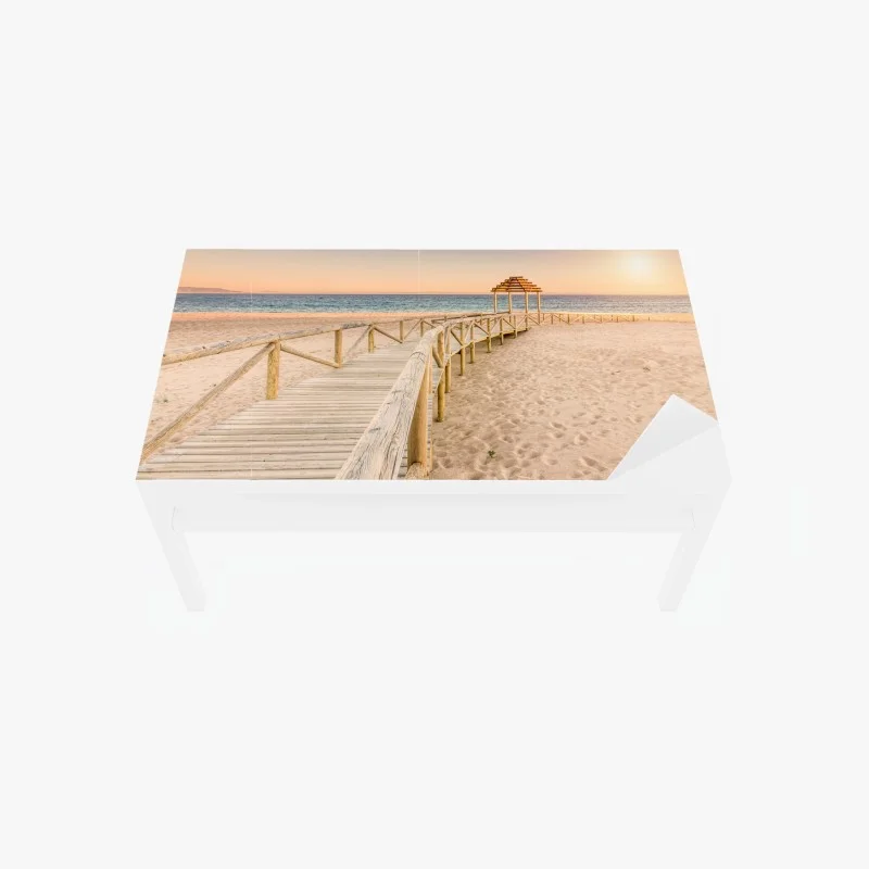 Table & desk veneer wooden boardwalk to Trafalgar beach at sunset