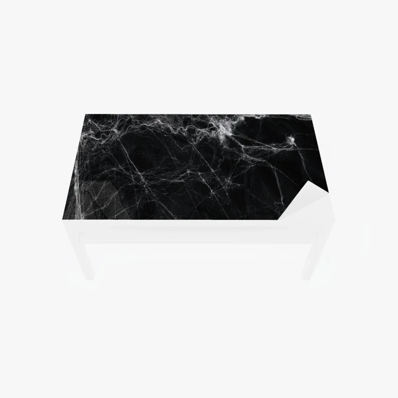 Table & desk veneer eerie cobweb on black background