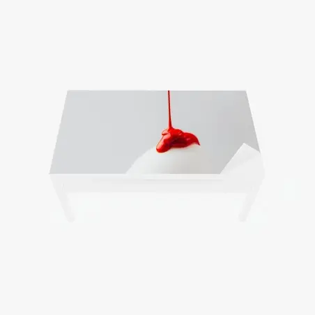 Table & desk veneer red paint drip on white egg • Wallissimo®
