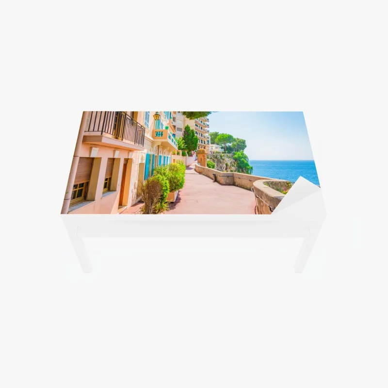 Table & desk veneer mediterranean seaside promenade with pastel buildings